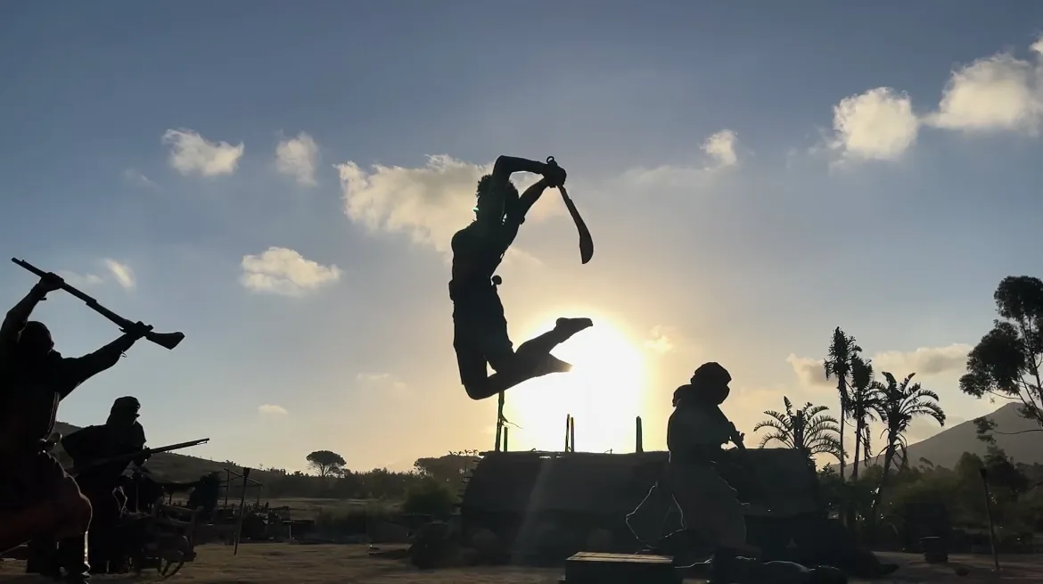 Film & Documentary — silhouetted warriors at sunrise